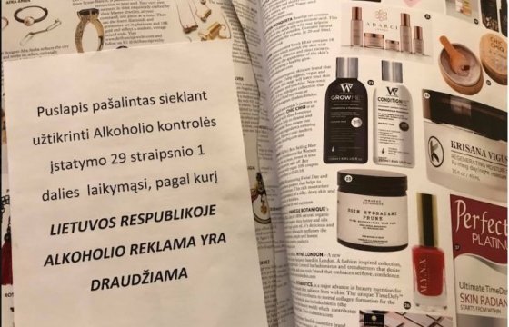В иностранных журналах в Литве заклеивают и вырывают рекламу алкоголя
